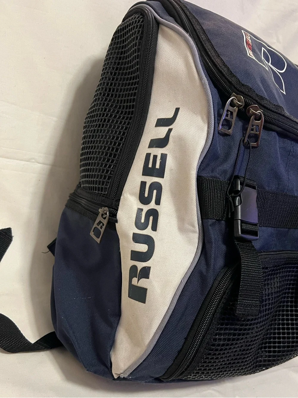 Russell Athletic Navy and White Backpack with Front Mesh Pocket